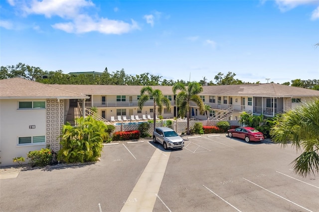 510 Granada Ave Unit 108, Venice, FL 34285 - view of building exterior featuring uncovered parking