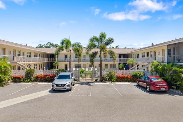 510 Granada Ave Unit 108, Venice, FL 34285 - view of property featuring uncovered parking and a residential view