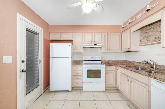 510 Granada Ave Unit 108, Venice, FL 34285 - kitchen with white appliances, under cabinet range hood, a ceiling fan, light tile patterned flooring, and light stone countertops
