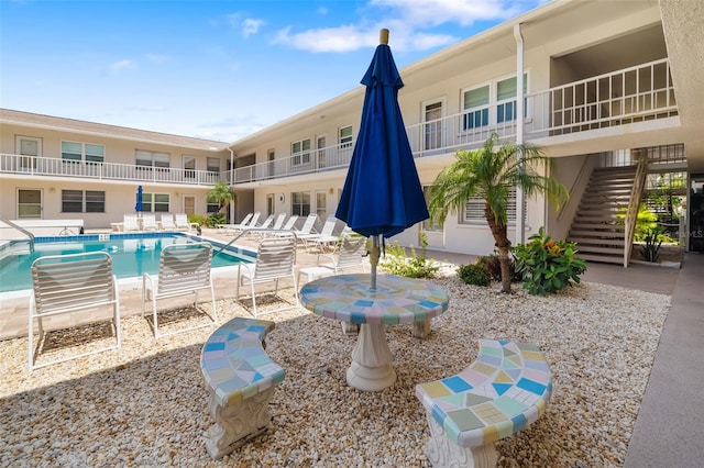 510 Granada Ave Unit 108, Venice, FL 34285 - community pool featuring stairs and a patio area