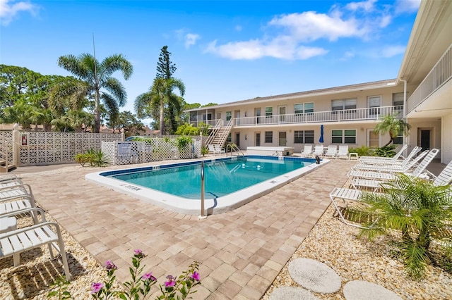 510 Granada Ave Unit 108, Venice, FL 34285 - community pool featuring stairs and a patio area