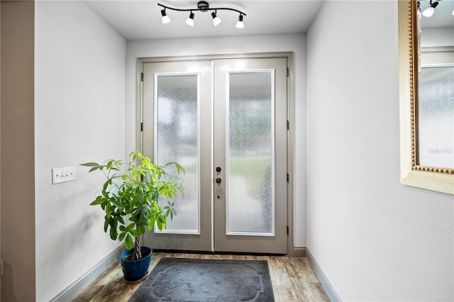 174 SW Caboose Dr, Fort White, FL 32038 - entryway with french doors and wood finished floors