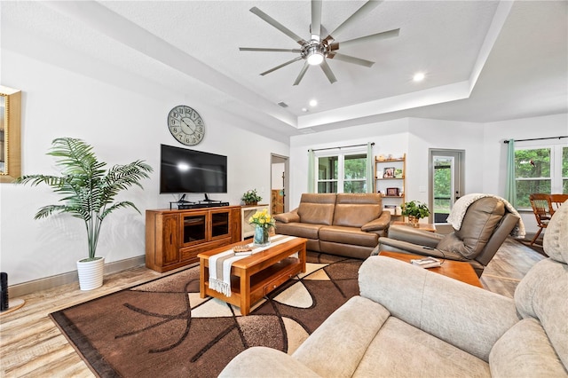 174 SW Caboose Dr, Fort White, FL 32038 - living room featuring a raised ceiling, ceiling fan, recessed lighting, and wood finished floors