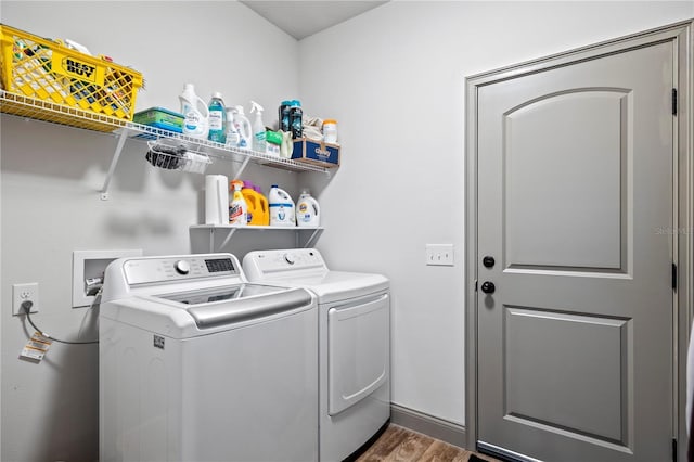 174 SW Caboose Dr, Fort White, FL 32038 - washroom with separate washer and dryer and wood finished floors