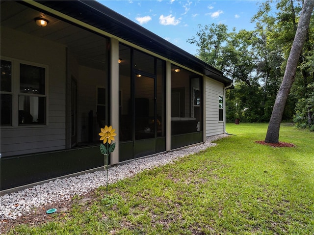 174 SW Caboose Dr, Fort White, FL 32038 - view of green lawn featuring a sunroom