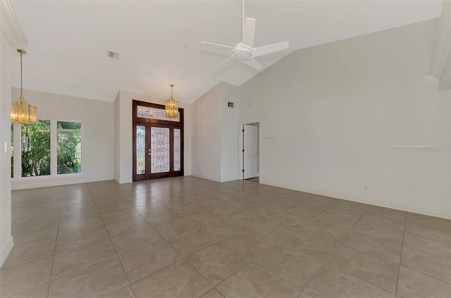 1236 Port Ln, Sarasota, FL 34242 - empty room featuring a chandelier, high vaulted ceiling, a ceiling fan, and light tile patterned floors