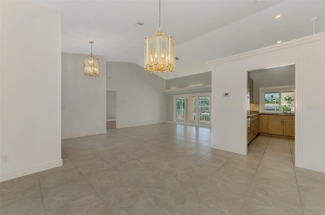1236 Port Ln, Sarasota, FL 34242 - spare room featuring a chandelier, vaulted ceiling, and light tile patterned floors