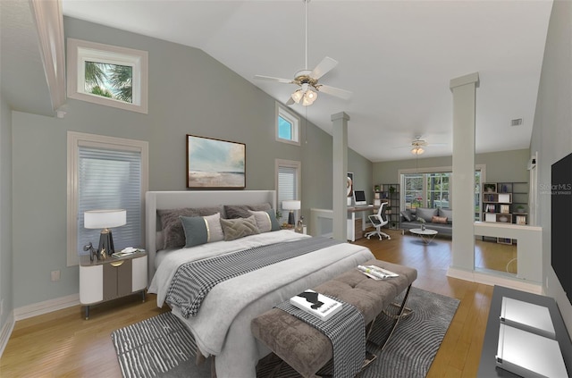 1236 Port Ln, Sarasota, FL 34242 - bedroom with multiple windows, decorative columns, wood finished floors, and high vaulted ceiling