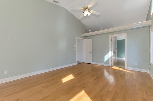 1236 Port Ln, Sarasota, FL 34242 - unfurnished bedroom with light wood-style flooring, high vaulted ceiling, and ensuite bathroom