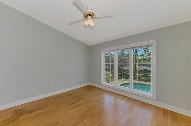 1236 Port Ln, Sarasota, FL 34242 - empty room featuring light wood finished floors and ceiling fan