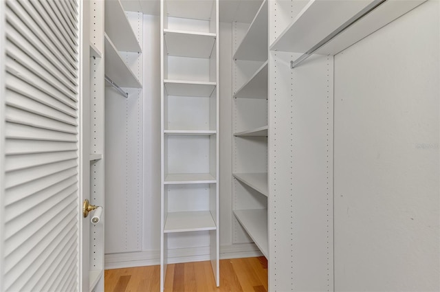1236 Port Ln, Sarasota, FL 34242 - spacious closet with wood finished floors