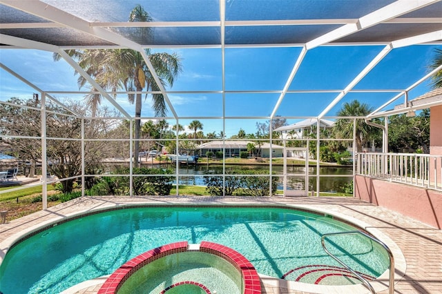 1236 Port Ln, Sarasota, FL 34242 - view of swimming pool with a water view, glass enclosure, and a pool with connected hot tub