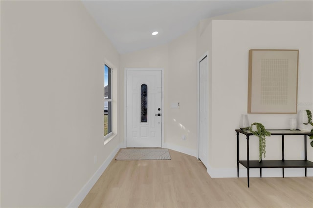 1820 Putney Cir, Orlando, FL 32837 - foyer with light wood-style floors, lofted ceiling, and recessed lighting