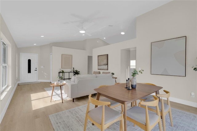 1820 Putney Cir, Orlando, FL 32837 - dining space with vaulted ceiling, light wood-type flooring, a ceiling fan, plenty of natural light, and recessed lighting