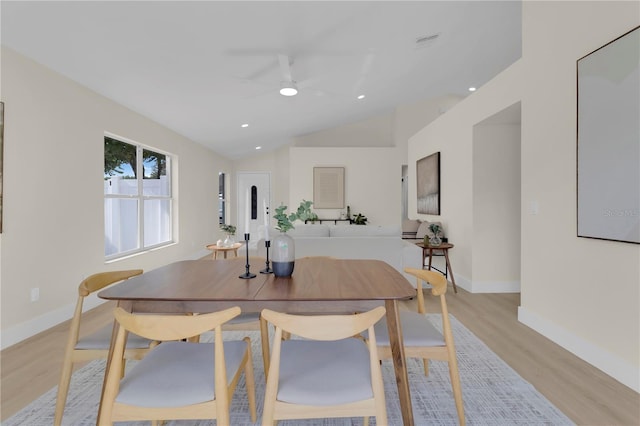 1820 Putney Cir, Orlando, FL 32837 - dining room with light wood-type flooring, ceiling fan, lofted ceiling, and recessed lighting