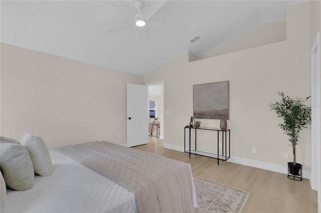 1820 Putney Cir, Orlando, FL 32837 - bedroom with light wood finished floors, lofted ceiling, and ceiling fan