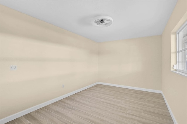 5830 Midnight Pass Rd Unit 108, Sarasota, FL 34242 - spare room featuring light wood-style floors and ceiling fan