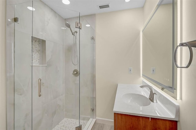 5830 Midnight Pass Rd Unit 108, Sarasota, FL 34242 - bathroom featuring a shower stall, vanity, and recessed lighting