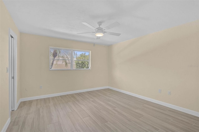 5830 Midnight Pass Rd Unit 108, Sarasota, FL 34242 - spare room with wood finish floors and ceiling fan