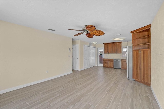 5830 Midnight Pass Rd Unit 108, Sarasota, FL 34242 - unfurnished living room featuring ceiling fan and light wood-style flooring