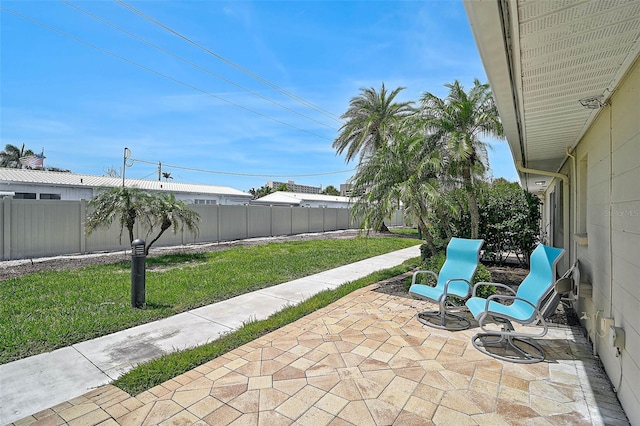 5830 Midnight Pass Rd Unit 108, Sarasota, FL 34242 - fenced backyard featuring a patio area