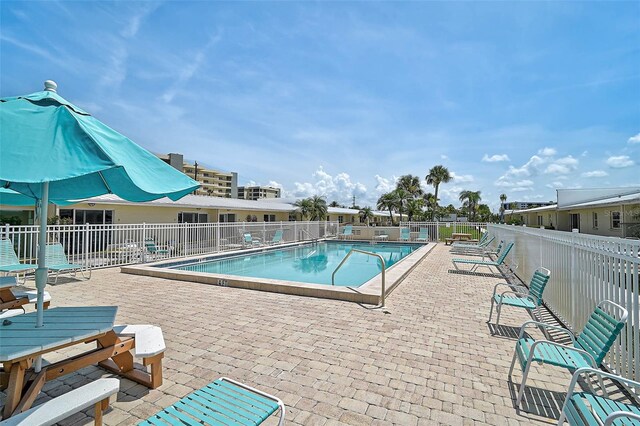 5830 Midnight Pass Rd Unit 108, Sarasota, FL 34242 - community pool with a patio area