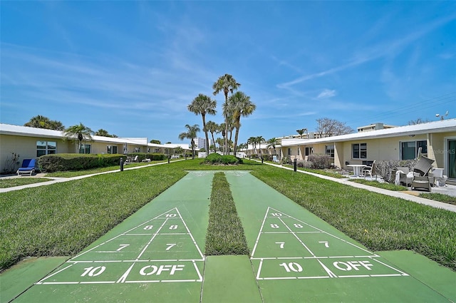 5830 Midnight Pass Rd Unit 108, Sarasota, FL 34242 - view of property's community with a lawn, shuffleboard, and a residential view