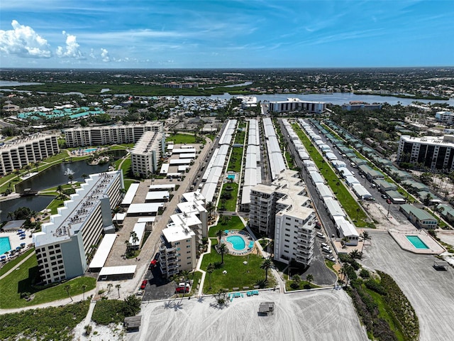 5830 Midnight Pass Rd Unit 108, Sarasota, FL 34242 - view of urban area with a pool area and a nearby body of water