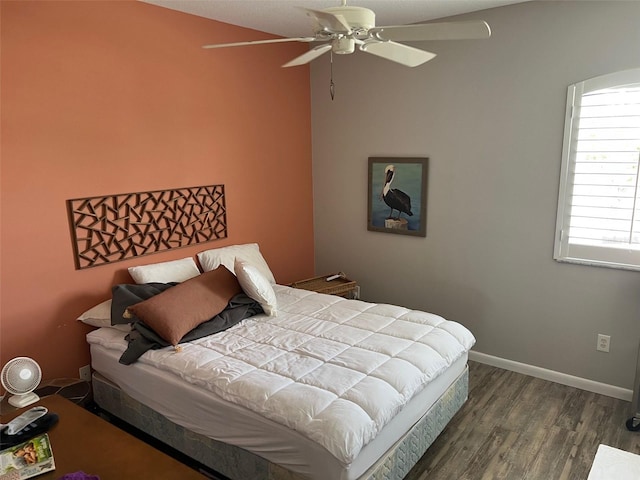 6444 7th Avenue Cir W Unit 6444, Bradenton, FL 34209 - bedroom featuring dark wood finished floors, multiple windows, and ceiling fan
