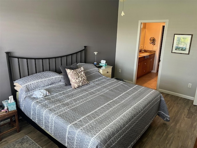 6444 7th Avenue Cir W Unit 6444, Bradenton, FL 34209 - bedroom with wood finished floors and ensuite bath