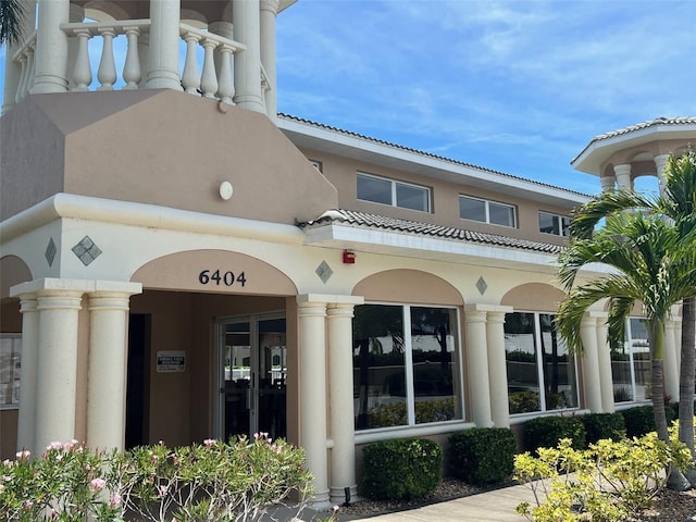 6444 7th Avenue Cir W Unit 6444, Bradenton, FL 34209 - property entrance featuring stucco siding and a tiled roof