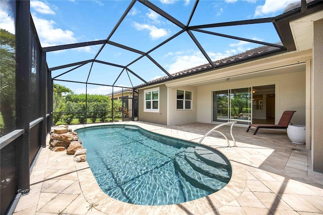 11680 Tapestry Ln, Venice, FL 34292 - swimming pool with a patio area and glass enclosure