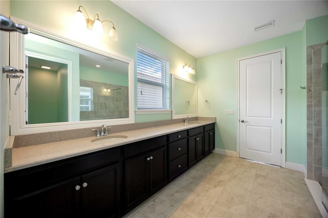 11680 Tapestry Ln, Venice, FL 34292 - full bathroom featuring double vanity and a tile shower