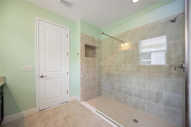 11680 Tapestry Ln, Venice, FL 34292 - bathroom with vanity and tiled shower