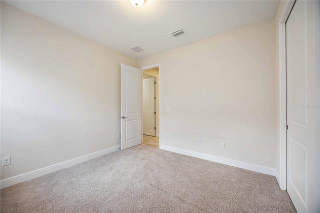 11680 Tapestry Ln, Venice, FL 34292 - unfurnished bedroom featuring carpet floors and a closet