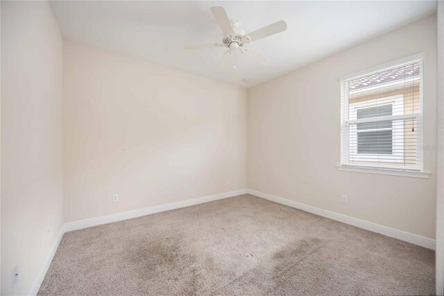 11680 Tapestry Ln, Venice, FL 34292 - empty room featuring carpet floors and a ceiling fan