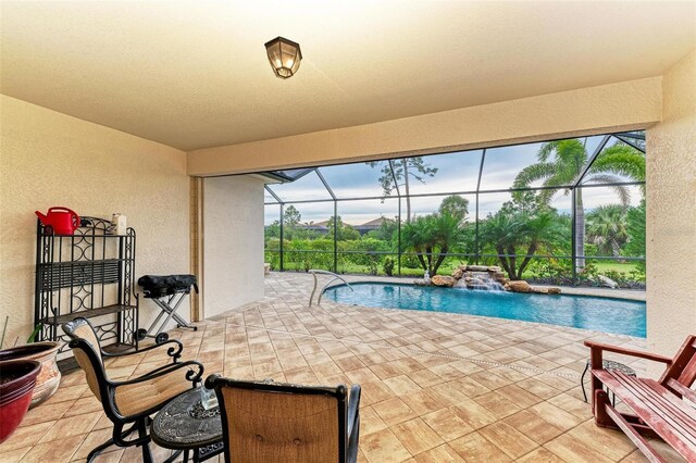 11680 Tapestry Ln, Venice, FL 34292 - outdoor pool with a patio area and glass enclosure