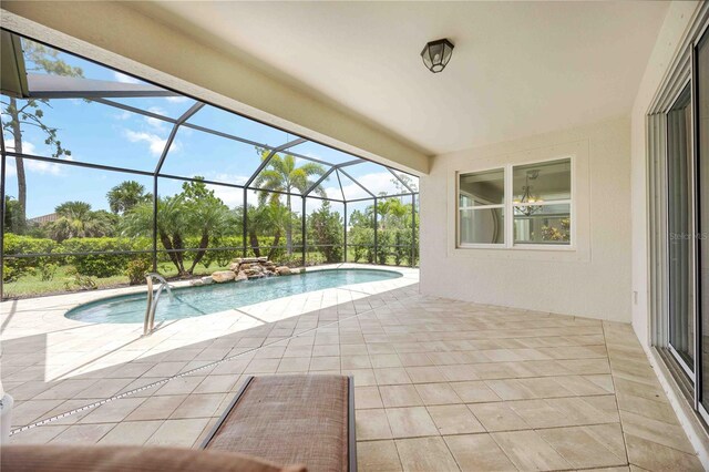 11680 Tapestry Ln, Venice, FL 34292 - outdoor pool featuring a patio, a lanai, and view of scattered trees