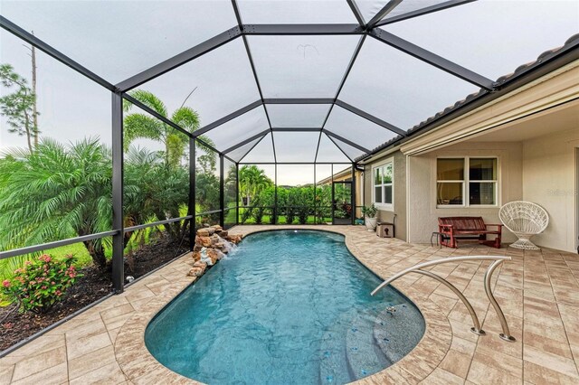 11680 Tapestry Ln, Venice, FL 34292 - swimming pool featuring a patio area and a lanai
