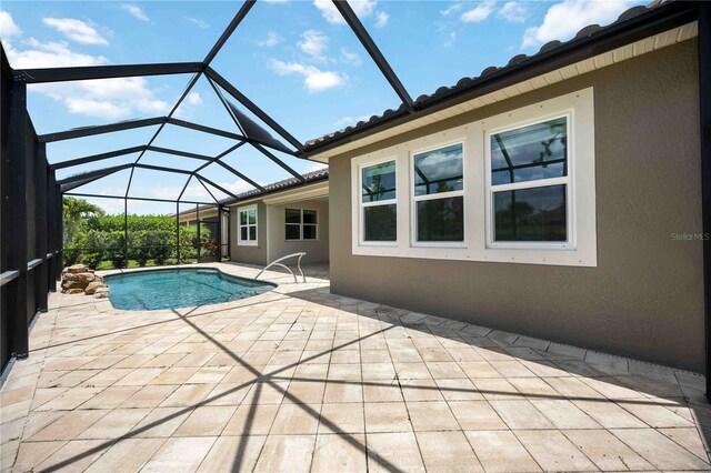11680 Tapestry Ln, Venice, FL 34292 - outdoor pool with a patio area and a lanai