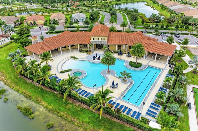 11680 Tapestry Ln, Venice, FL 34292 - community pool featuring a water view and a patio