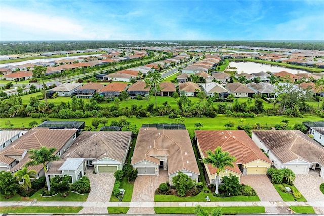11680 Tapestry Ln, Venice, FL 34292 - aerial perspective of suburban area with a large body of water