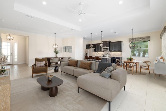 13789 Old Creek Ct, Parrish, FL 34219 - living area with plenty of natural light, light tile patterned floors, recessed lighting, a ceiling fan, and ornamental molding