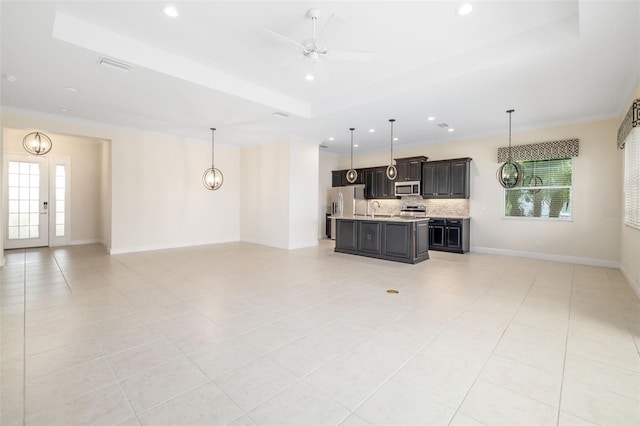 13789 Old Creek Ct, Parrish, FL 34219 - unfurnished living room with light tile patterned floors, a ceiling fan, recessed lighting, a raised ceiling, and ornamental molding