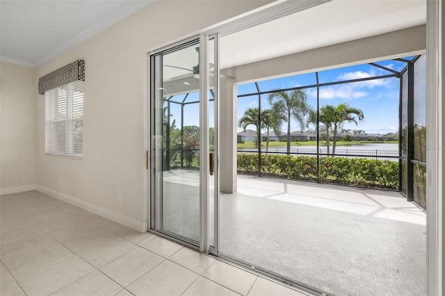 13789 Old Creek Ct, Parrish, FL 34219 - empty room with a sunroom, crown molding, a water view, ceiling fan, and light tile patterned flooring