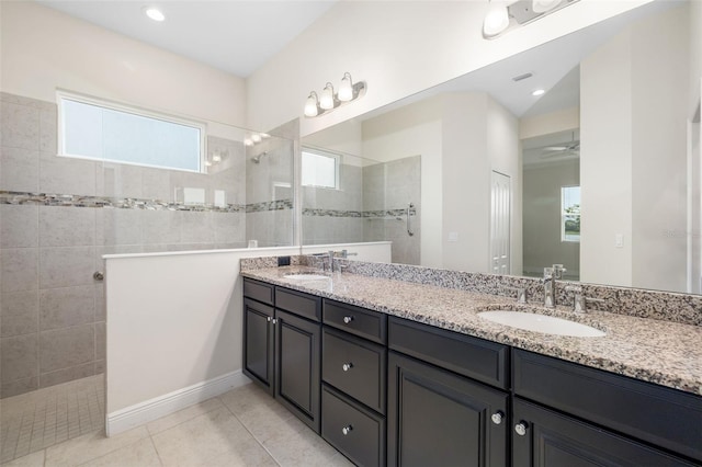 13789 Old Creek Ct, Parrish, FL 34219 - bathroom with double vanity, a walk in shower, plenty of natural light, and tile patterned floors