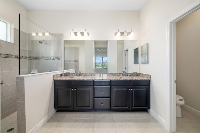 13789 Old Creek Ct, Parrish, FL 34219 - bathroom with a walk in shower, double vanity, plenty of natural light, and tile patterned floors