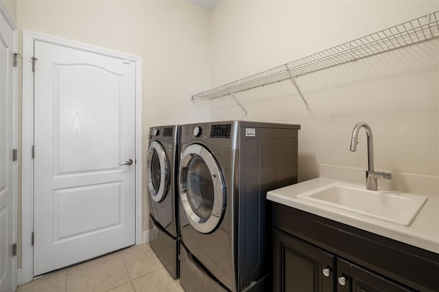 13789 Old Creek Ct, Parrish, FL 34219 - laundry room featuring cabinet space, washer and dryer, and light tile patterned flooring