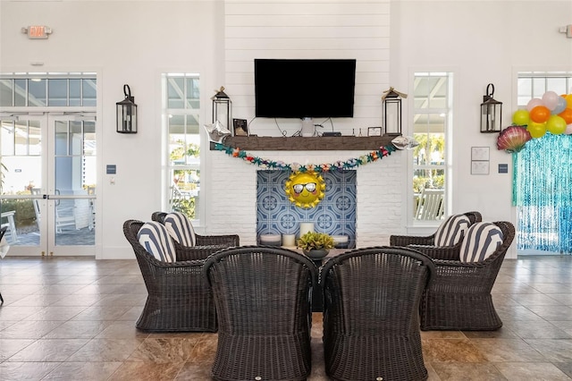 13789 Old Creek Ct, Parrish, FL 34219 - living room featuring plenty of natural light, french doors, and a high ceiling