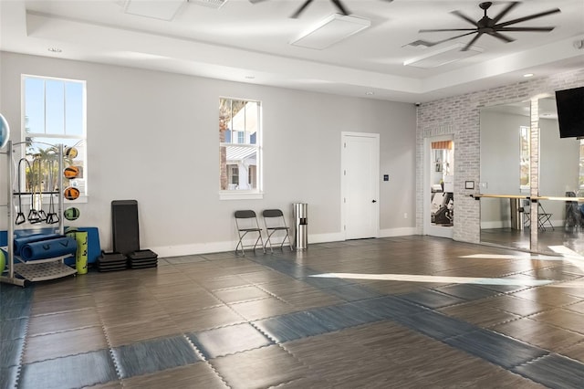 13789 Old Creek Ct, Parrish, FL 34219 - workout room with a ceiling fan, a tray ceiling, and recessed lighting